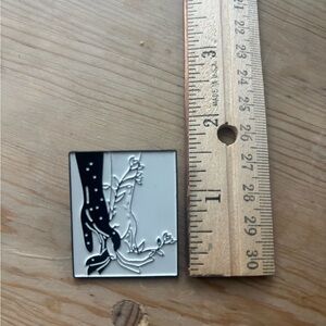Hands enamel pin in black and white